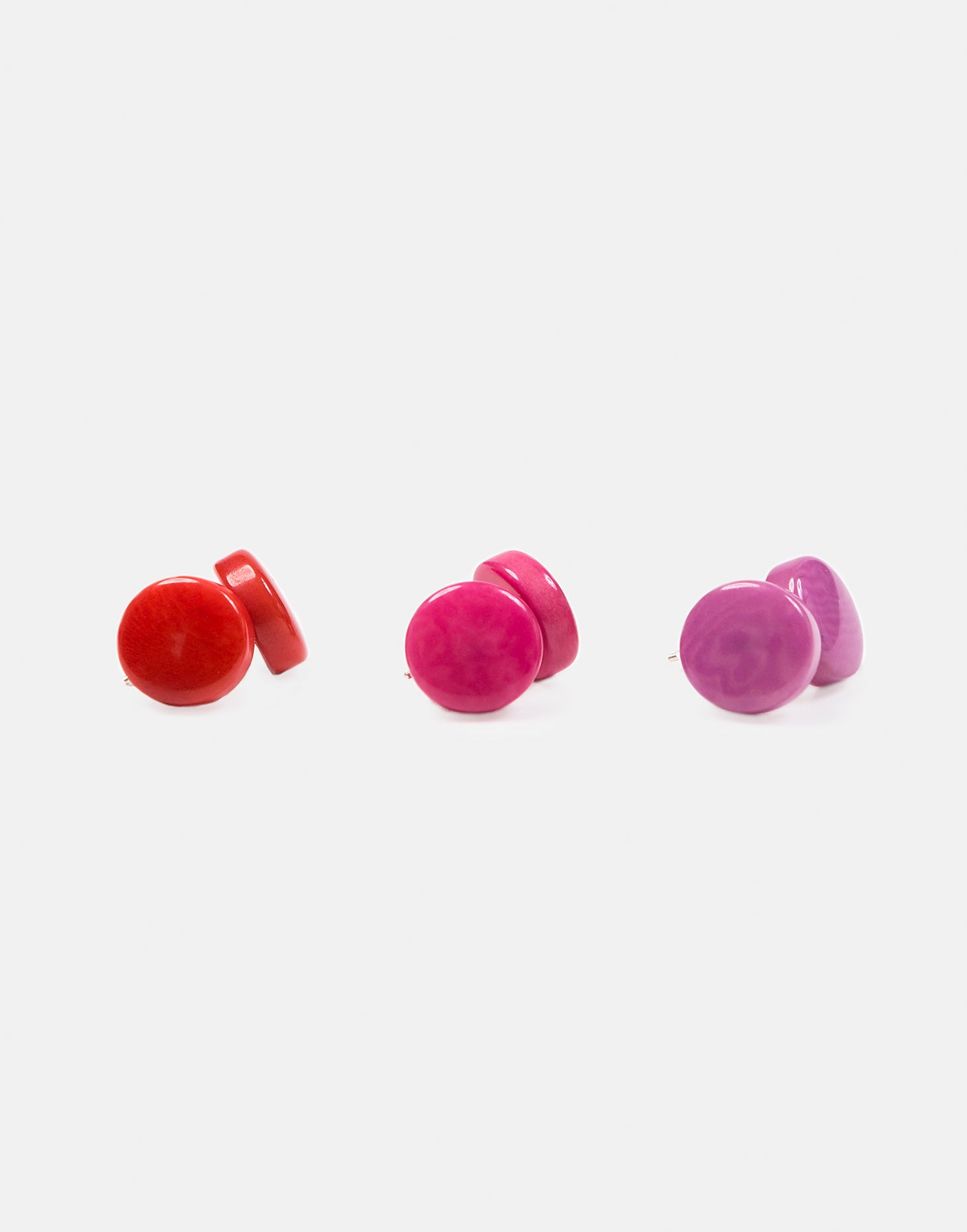 Confetti Tagua Stud Trio Set featuring colorful hand-cut tagua nut earrings with sterling silver findings, displayed in eco-friendly packaging.