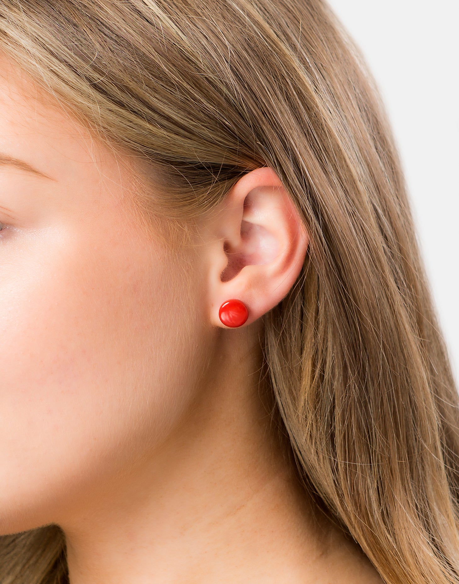 Colorful Confetti Tagua Studs Earrings made from organic tagua nut with sterling silver findings, showcasing unique textures and hues.