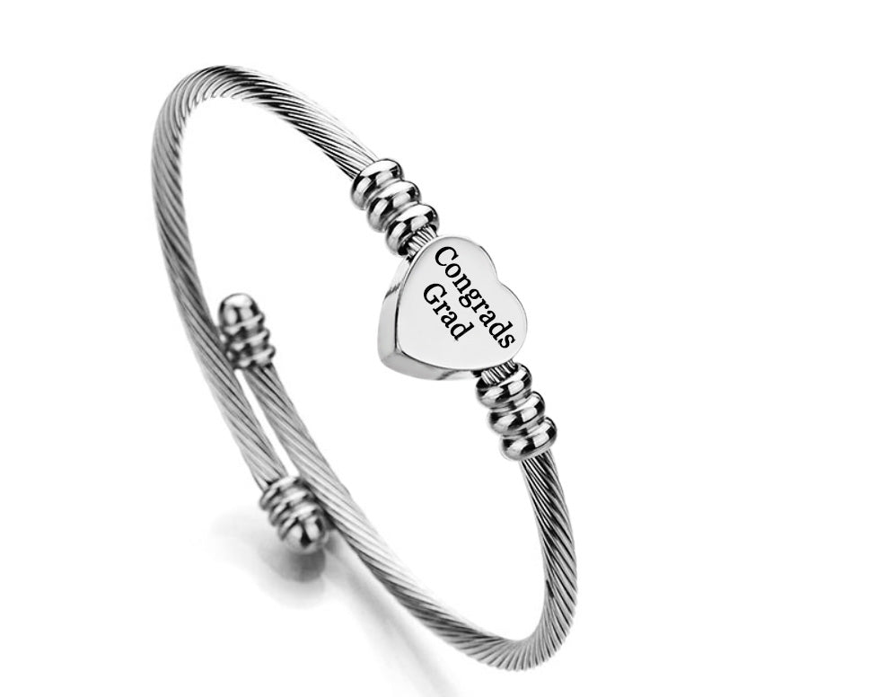 Silver stainless steel heart charm bangle for graduation gifts, adjustable and lead-free.