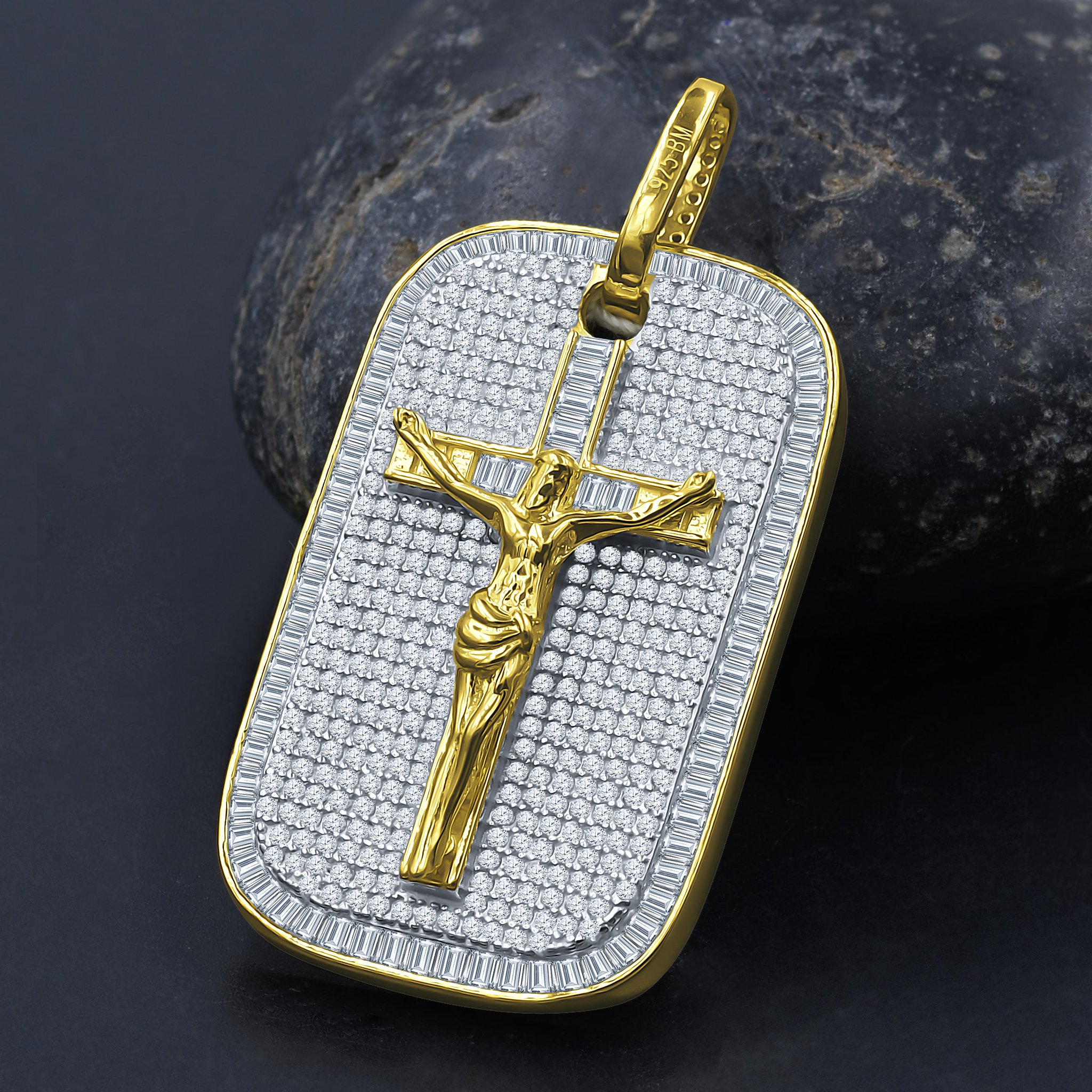 A beautiful consecrated silver pendant featuring a cross design, embellished with sparkling cubic zirconia stones, showcasing elegance and spirituality.