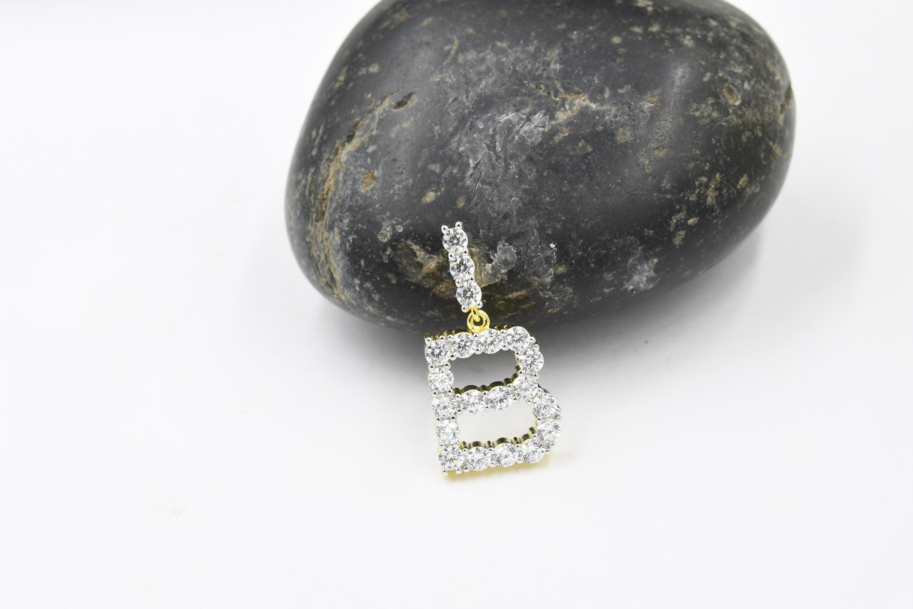 ABSEY LOCKET handcrafted 925 sterling silver pendant with cubic zircon stones, showcasing elegance and charm.