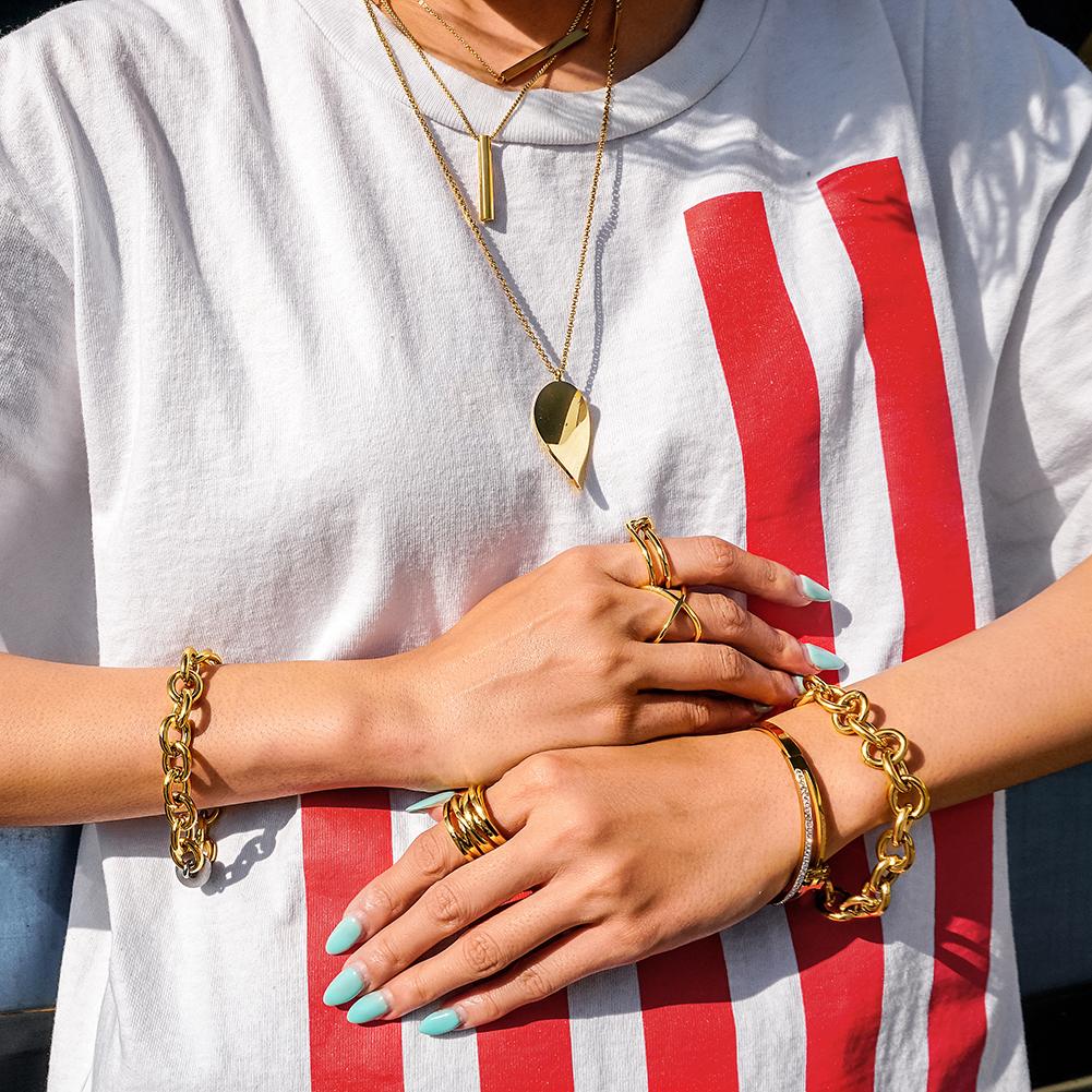 A stylish Cable Wire Vintage Toggle Bracelet made of surgical stainless steel with 14K gold plating, featuring a vintage toggle closure.