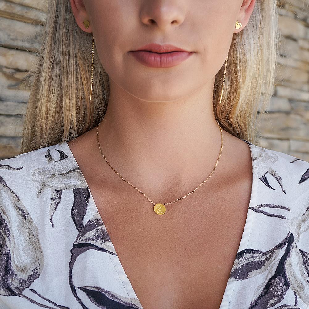 Glossy Gold Round Zodiac Necklace featuring a round zodiac pendant on a delicate chain, made from stainless steel with gold plating.