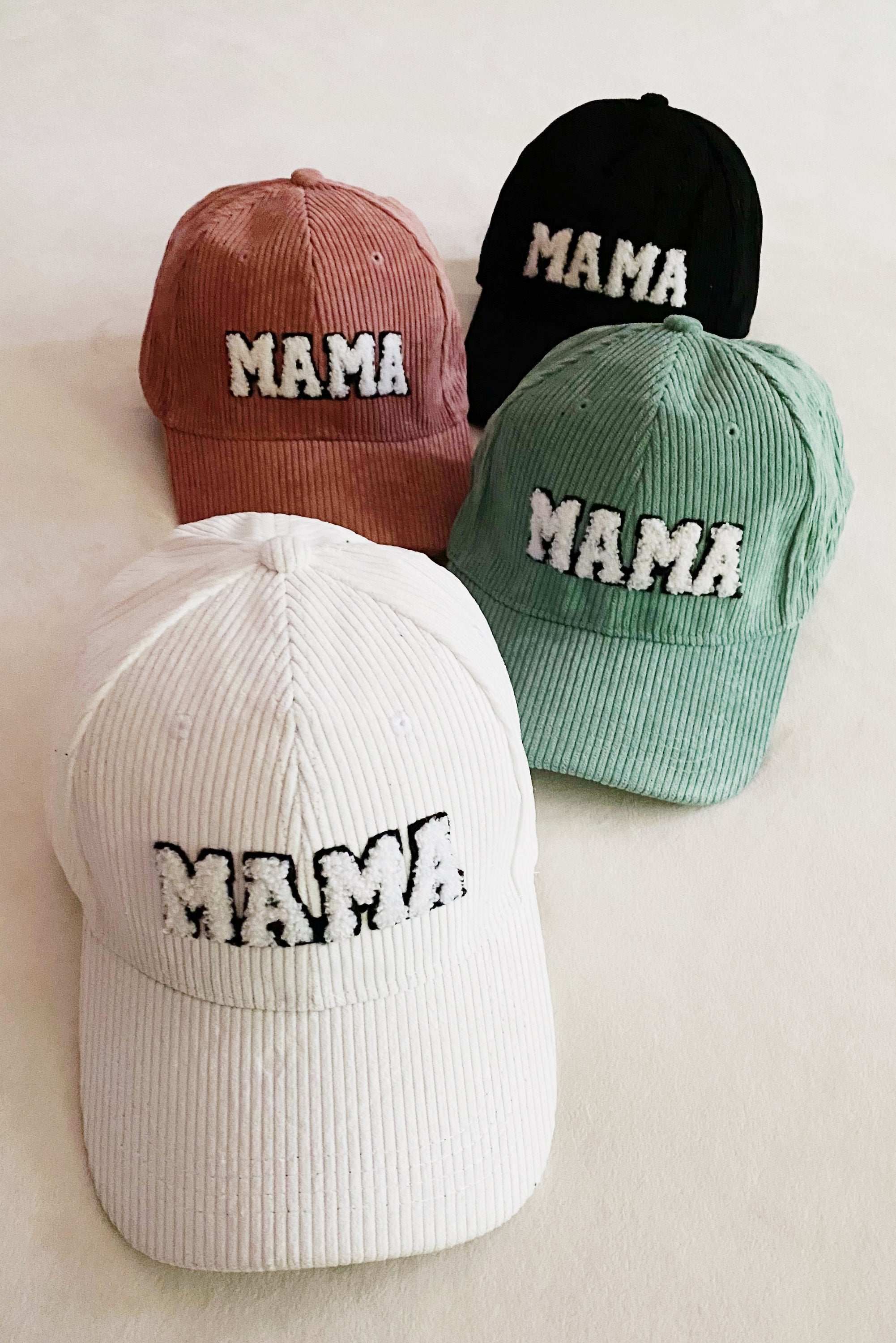 Corduroy Mama Ball Cap featuring fuzzy patch lettering and adjustable strap.