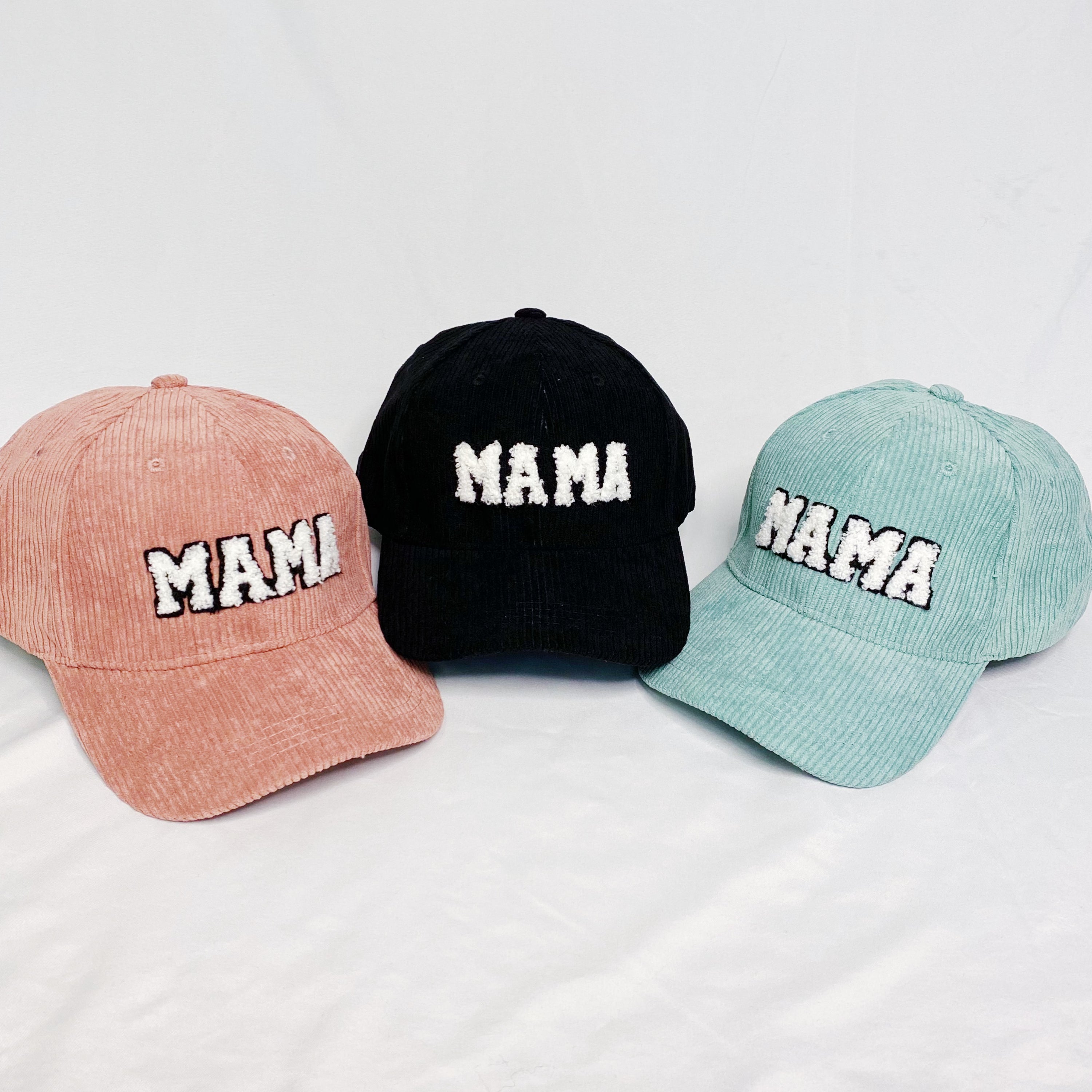 Corduroy Mama Ball Cap featuring fuzzy patch lettering and adjustable strap.