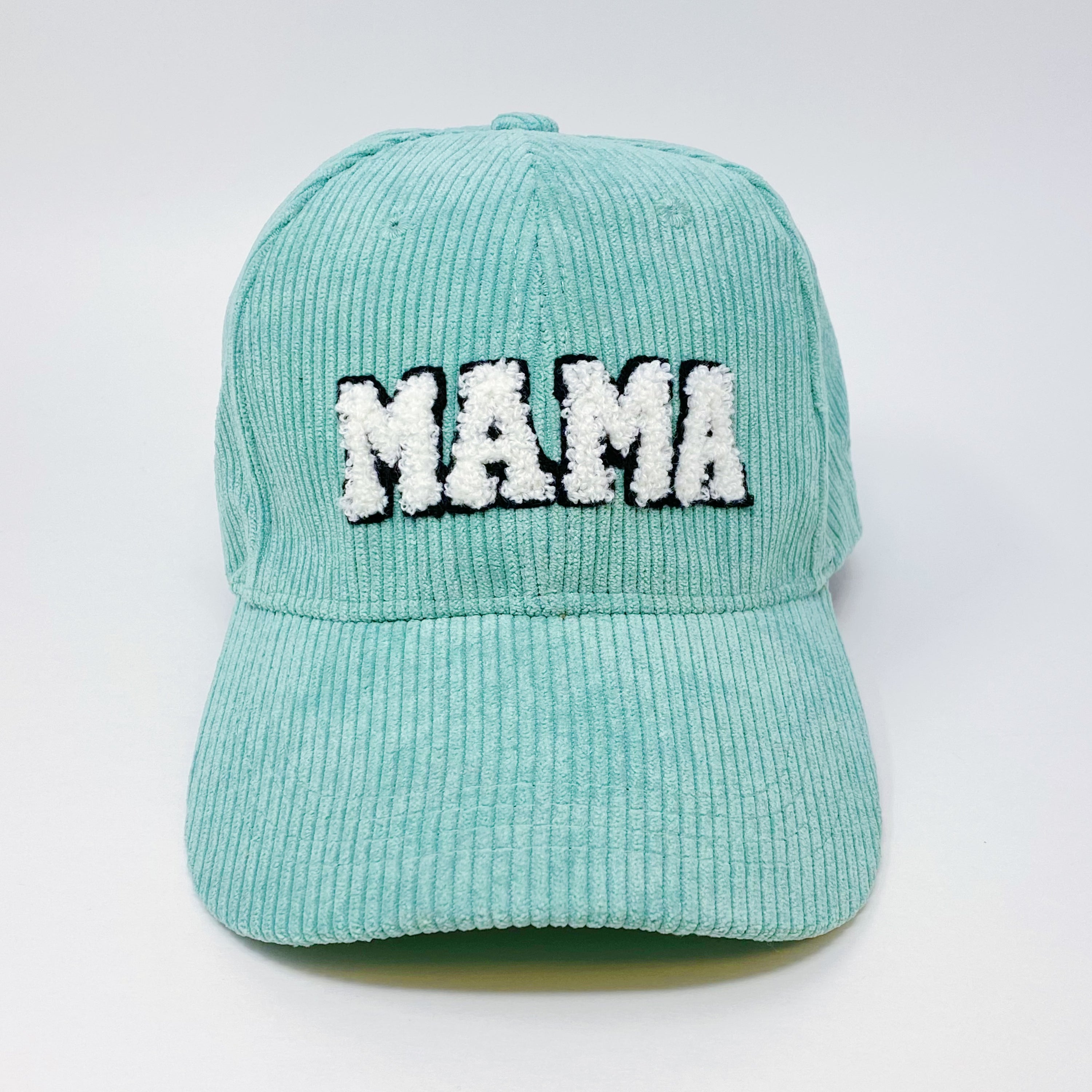 Corduroy Mama Ball Cap featuring fuzzy patch lettering and adjustable strap.