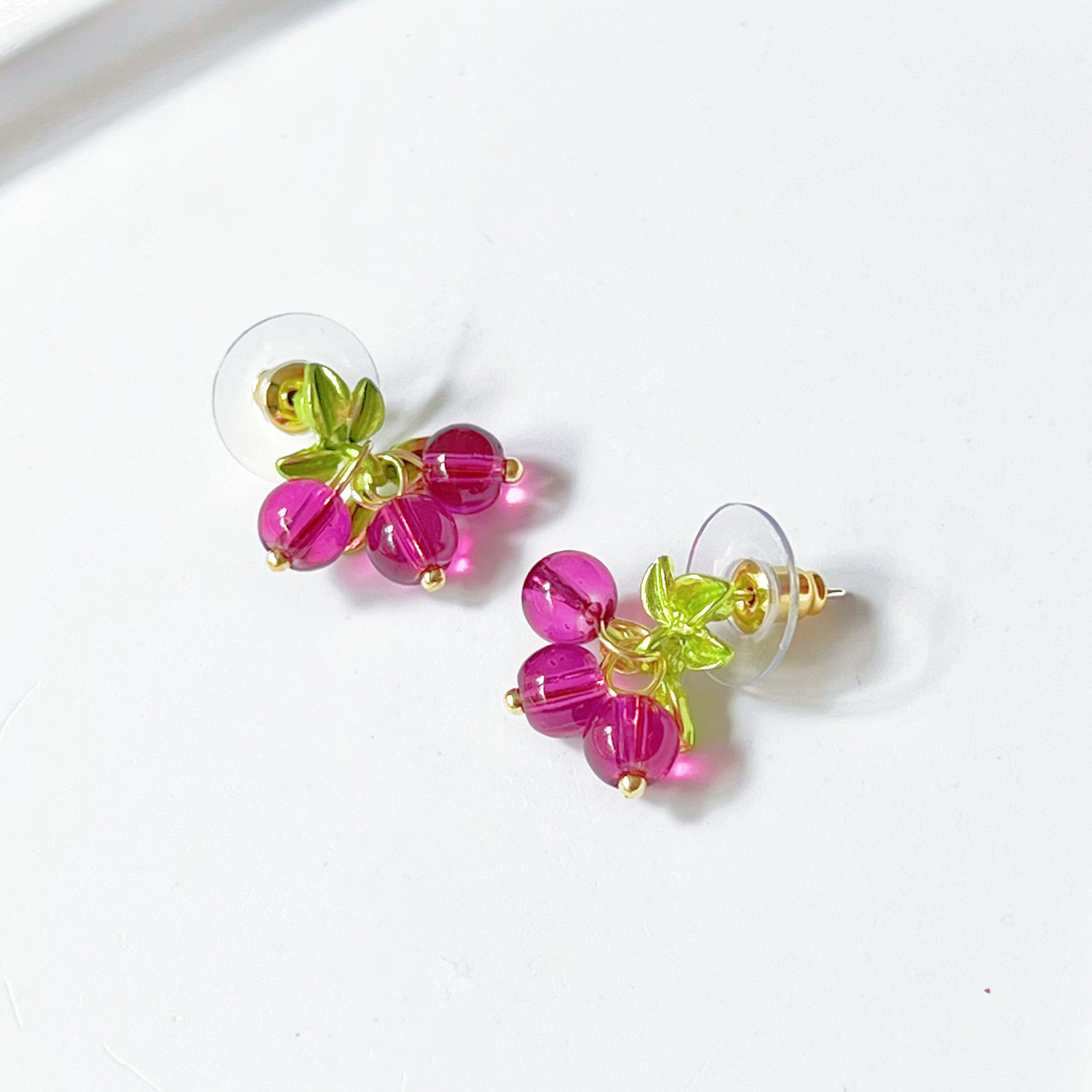 Cranberry with Leaves Plant Earrings featuring red beads and gold-plated bronze base, elegantly designed for nature lovers.