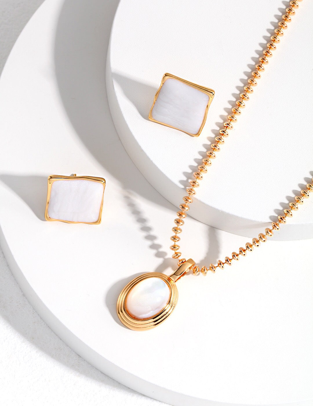 Elegant Cream Glazed Square Earrings made of gold vermeil, showcasing a stylish square design.