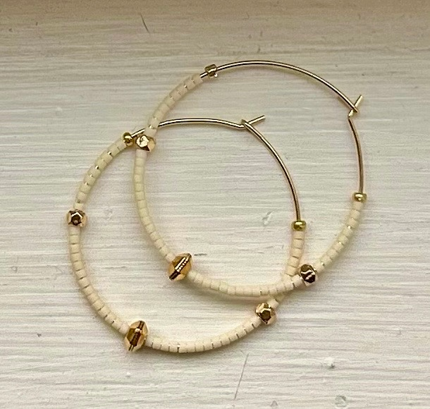 Creamy White & Bold Gold Beaded Hoops featuring gold-colored hoops and Czech glass seed beads, perfect for bohemian style.