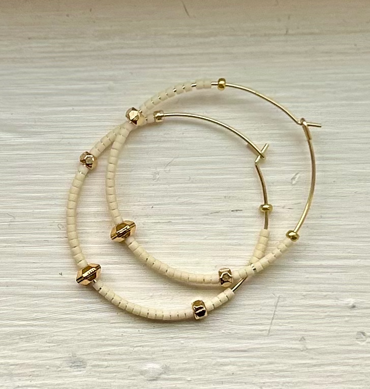 Creamy White & Bold Gold Beaded Hoops featuring gold-colored hoops and Czech glass seed beads, perfect for bohemian style.