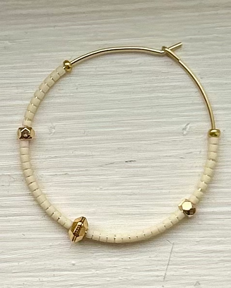 Creamy White & Bold Gold Beaded Hoops featuring gold-colored hoops and Czech glass seed beads, perfect for bohemian style.