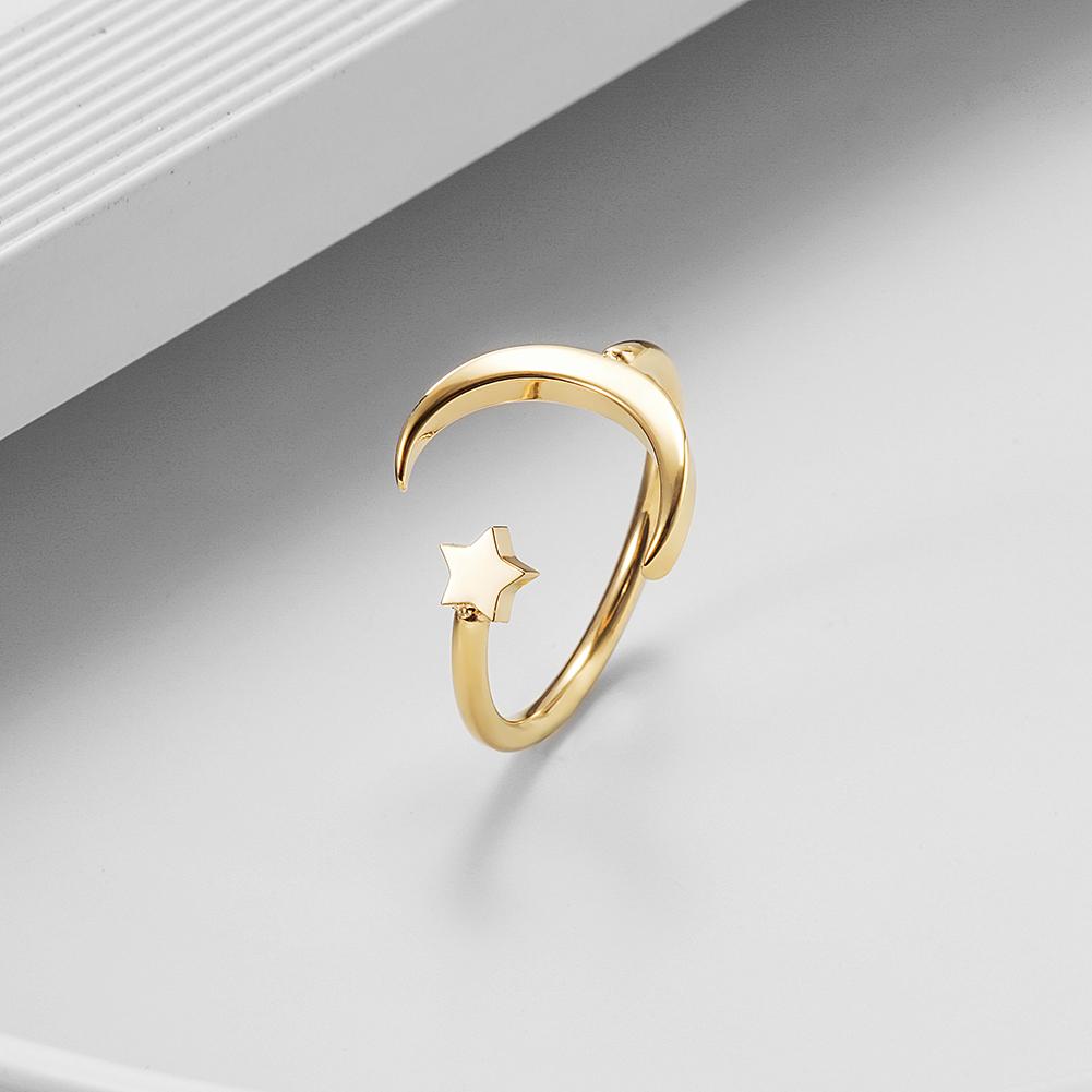 Crescent Moon and Star Ring made of surgical stainless steel with gold plating, featuring a delicate celestial design.