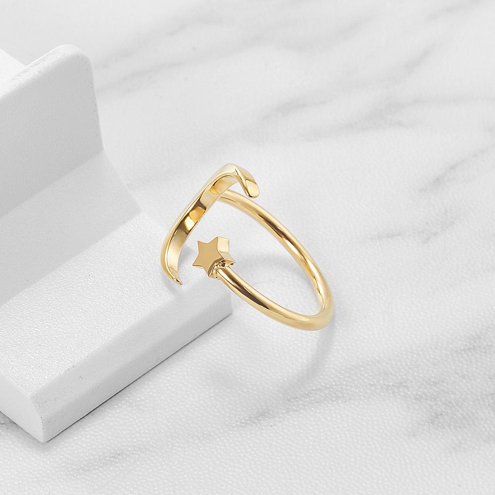 Crescent Moon and Star Ring made of surgical stainless steel with gold plating, featuring a delicate celestial design.