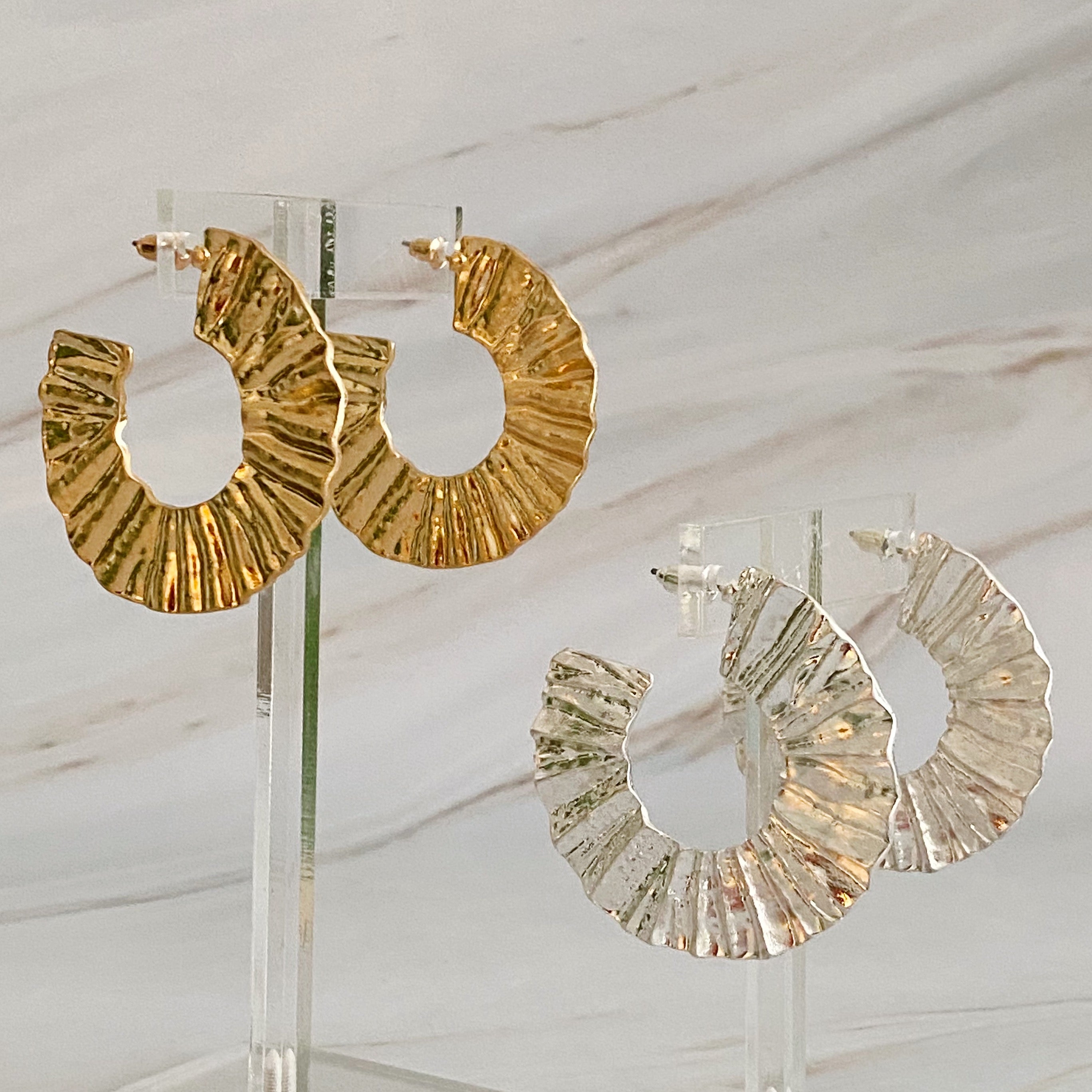 A pair of Crinkled Art Hoop Earrings showcasing a unique crinkled design in a plated alloy metal finish.