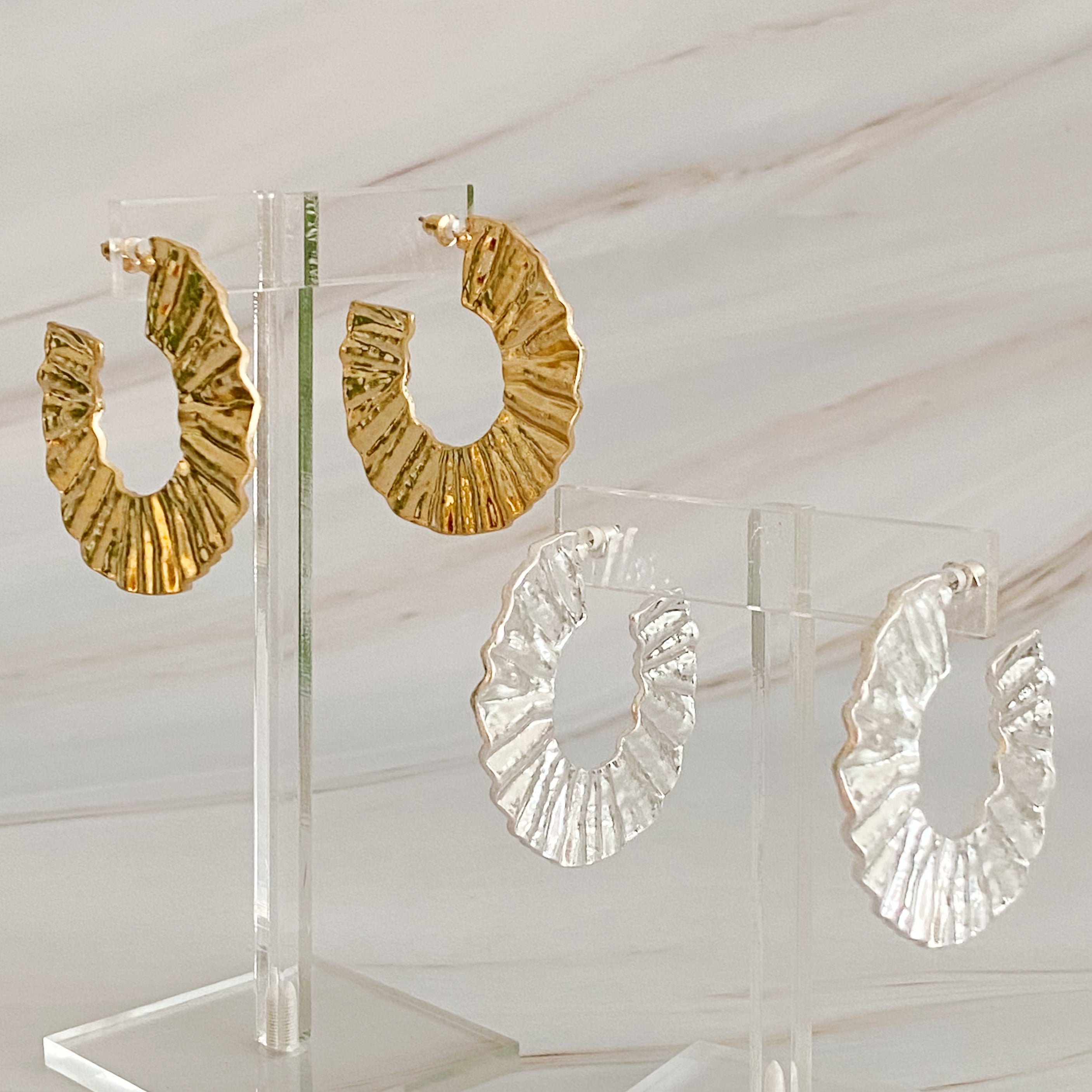 A pair of Crinkled Art Hoop Earrings showcasing a unique crinkled design in a plated alloy metal finish.