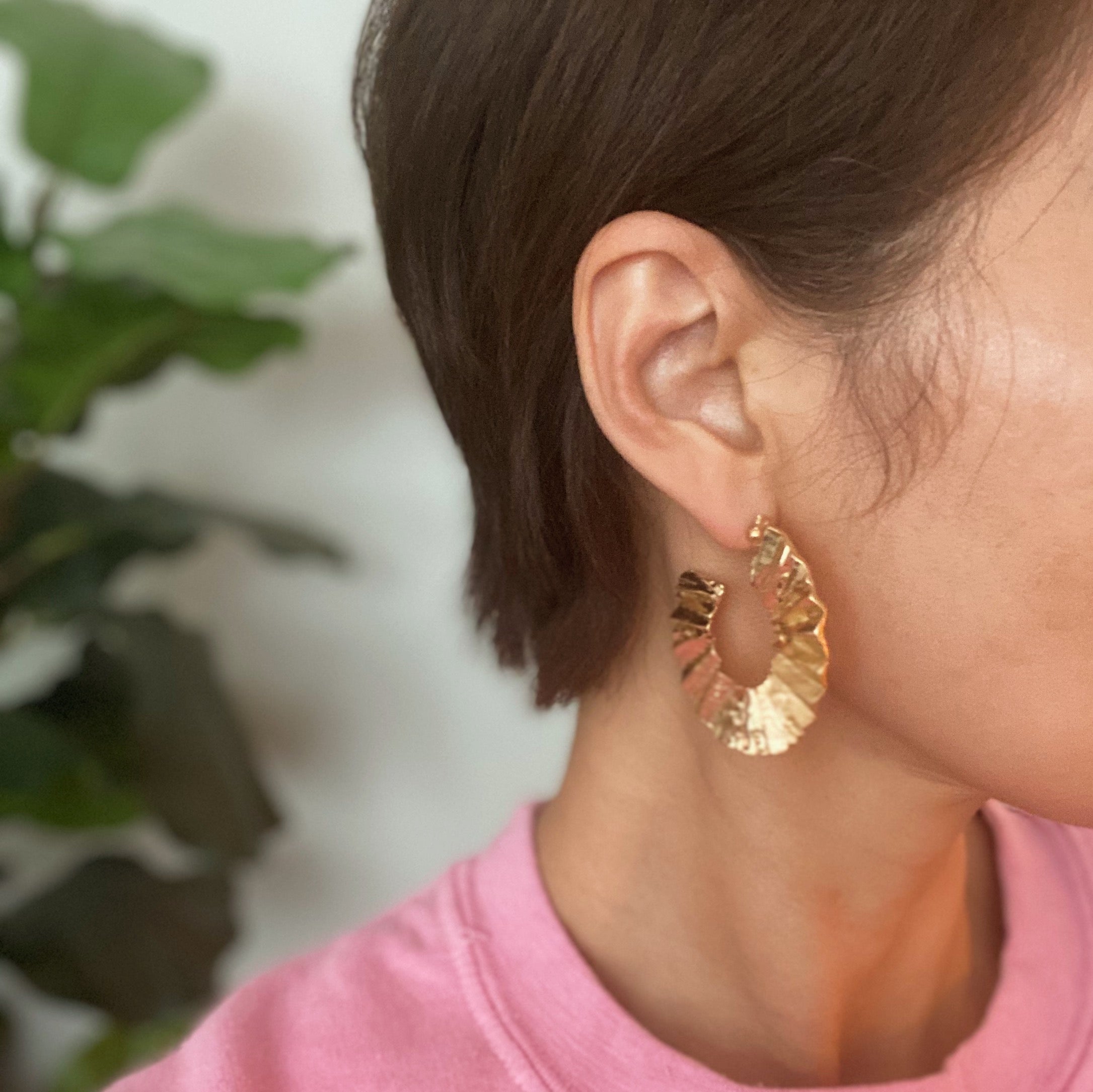 A pair of Crinkled Art Hoop Earrings showcasing a unique crinkled design in a plated alloy metal finish.