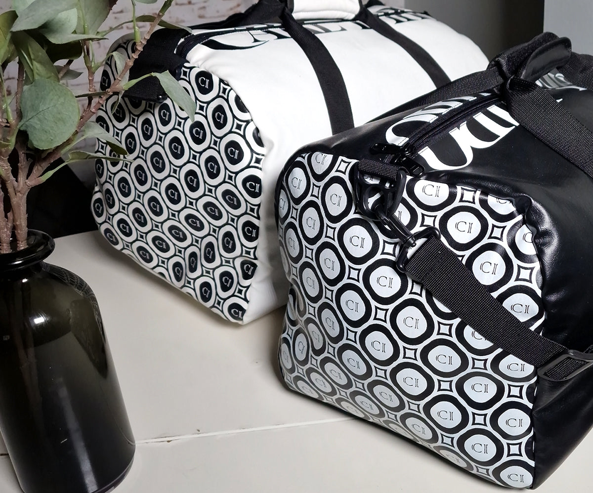 CRLi Cuero Bolsa in white, showcasing its spacious design and multiple pockets.