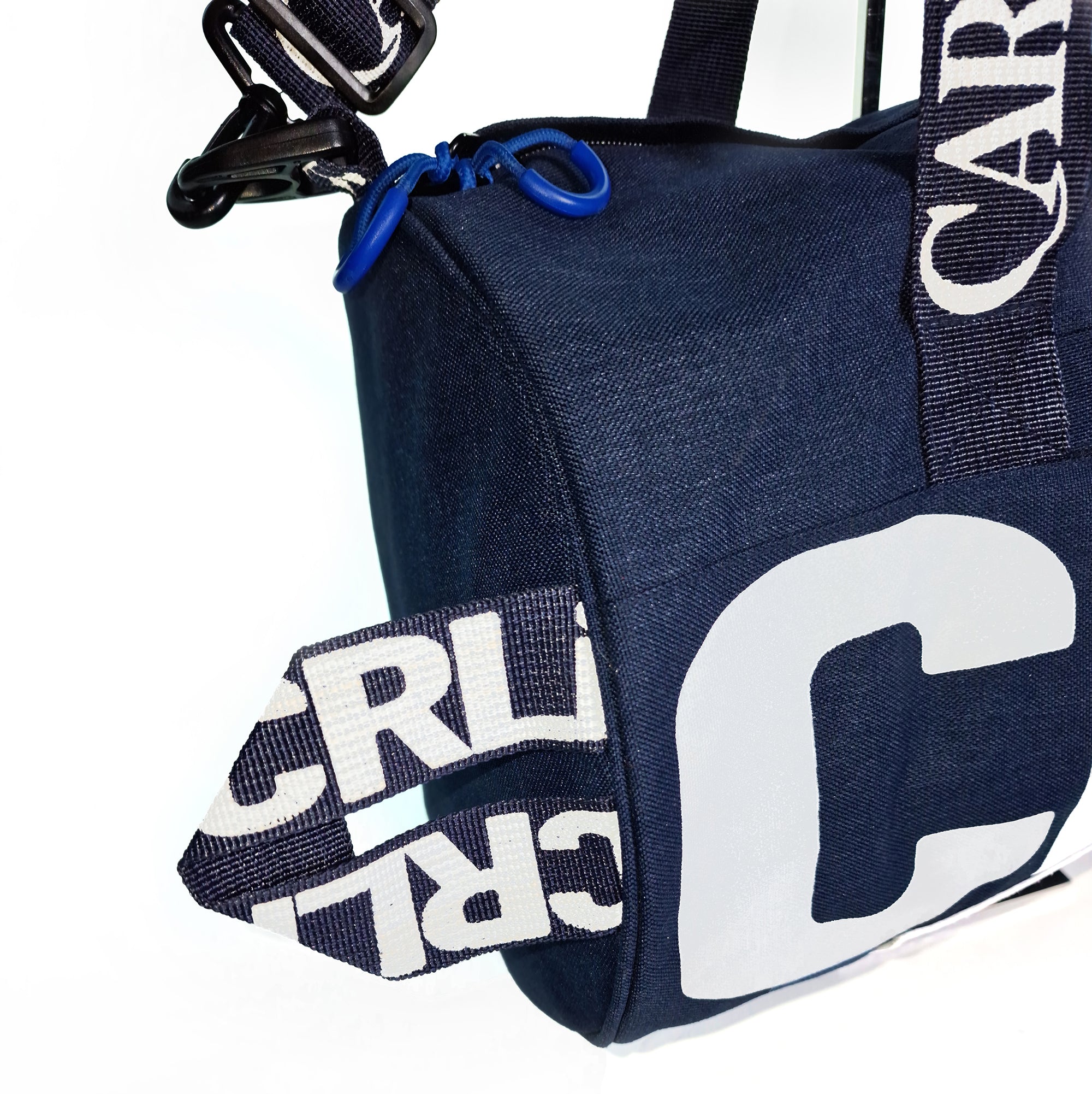 CRLi Extro Denim in denim color, showcasing eco-friendly recycled nylon fabric, designed for outdoor sports.