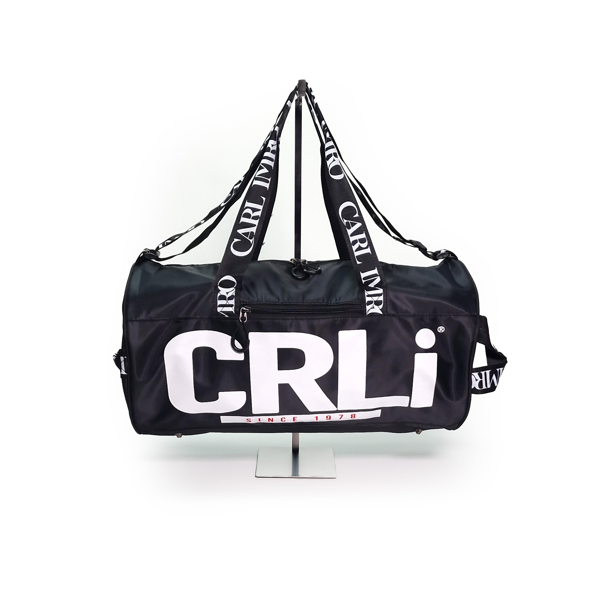 CRLi Extro outdoor sports bag in black, made from eco-friendly recycled nylon fabric, showcasing its sleek design and compact size.