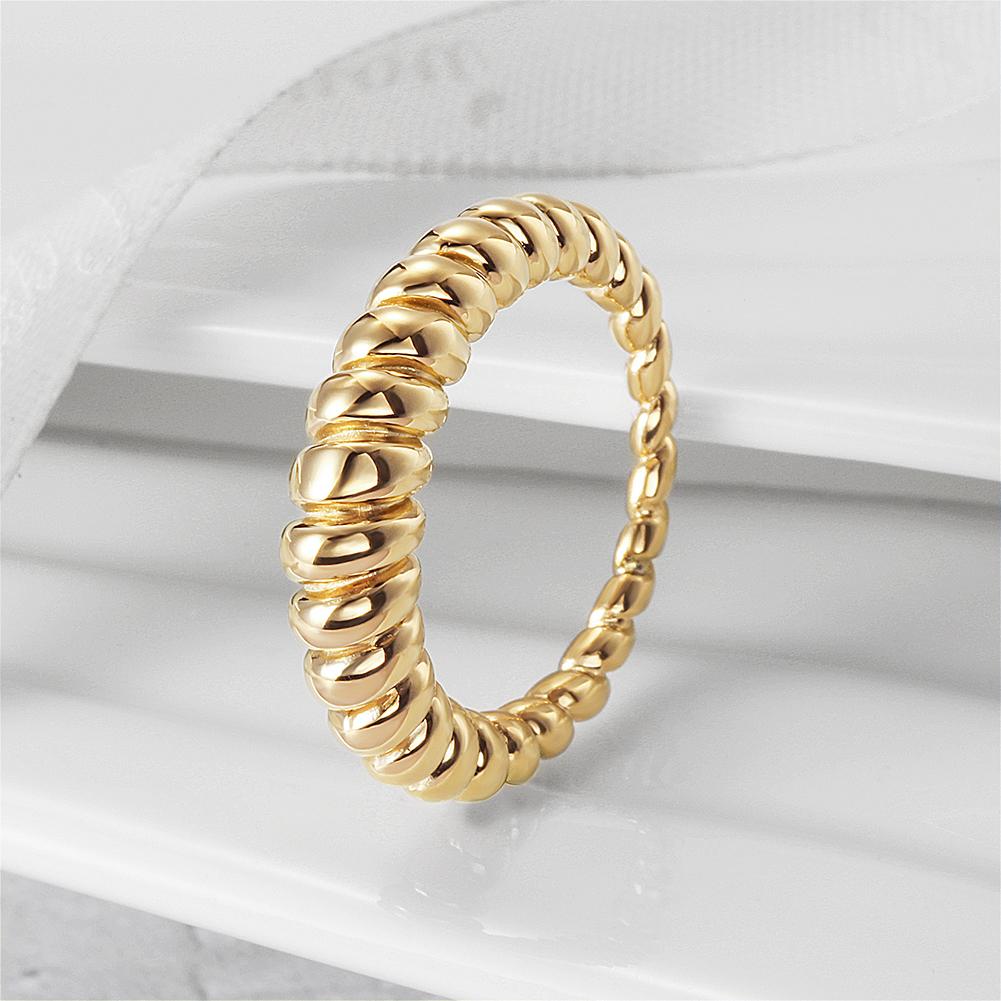 Elegant Croissant Ring made of 316L surgical stainless steel with 14K gold PVD plating, showcasing its unique design and luxurious finish.