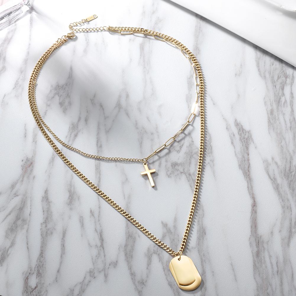 Elegant Cross & Tag Double Pendant Necklace made of surgical stainless steel with gold plating.