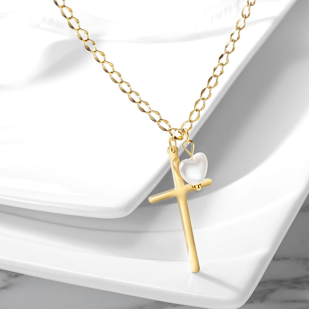 Elegant Cross necklace featuring a love-shaped pearl pendant, crafted from stainless steel with gold plating.