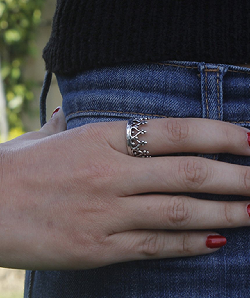 A stunning brass Crown Ring with a simplistic crown design, perfect for stacking and showcasing elegance.