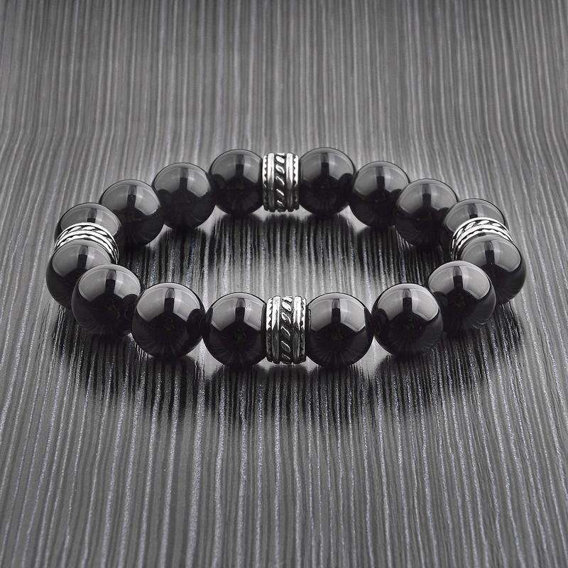 Crucible Stainless Steel Polished Onyx Tribal Beaded Stretch Bracelet featuring natural stone beads and polished stainless steel spacers.