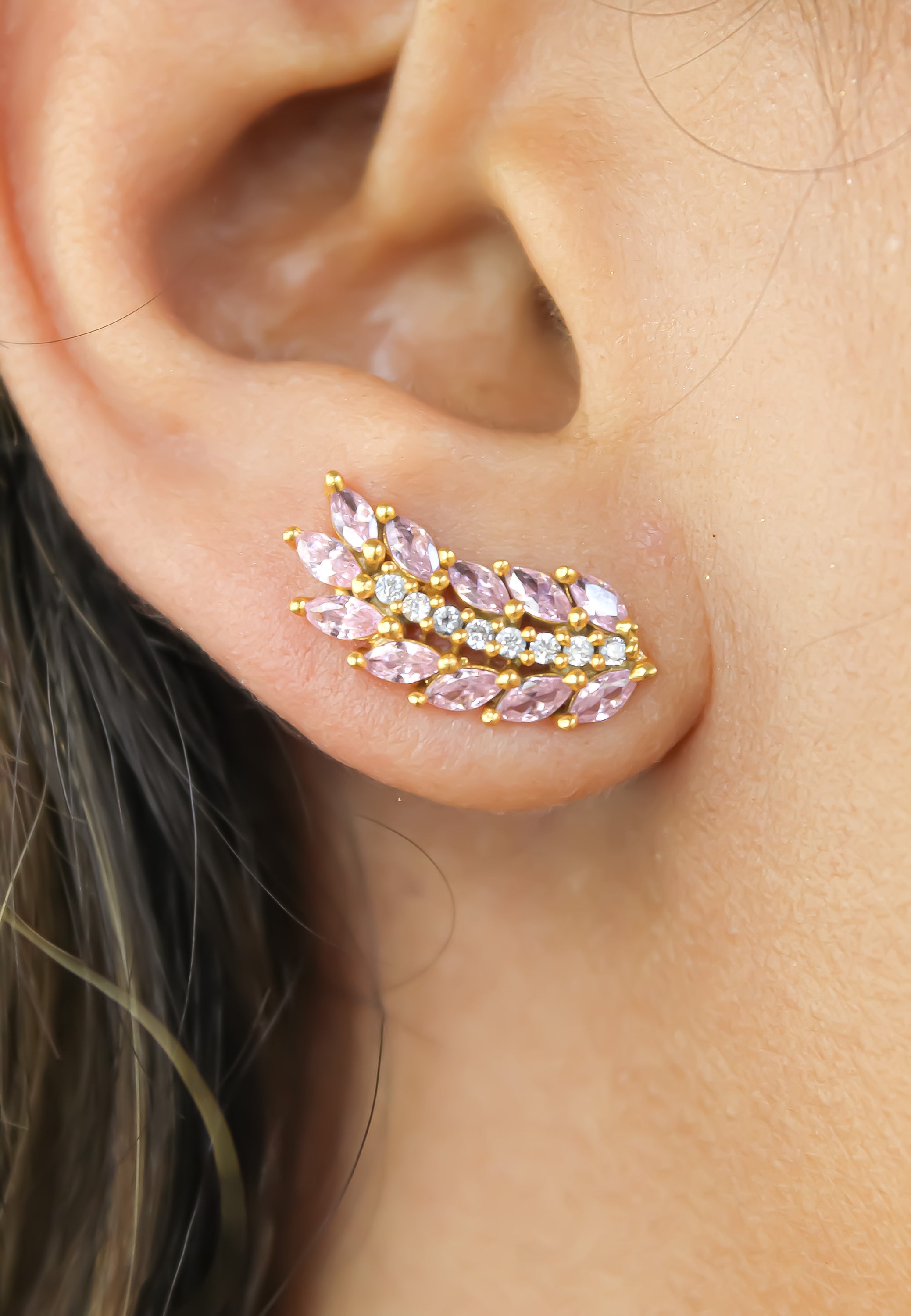 Elegant Cruise Wings Earrings featuring 18K gold plating and 19 sparkling zirconia stones, designed for sensitive ears.