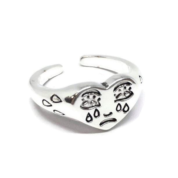 Crying Love Heart Band Ring made of sterling silver plated steel alloy, showcasing a heart design, perfect for unisex wear.