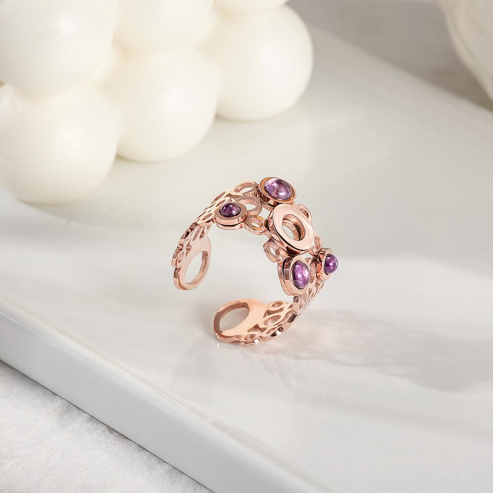 Elegant Crystal Circle Ring featuring interconnected circles and four purple pearls, perfect for any occasion.