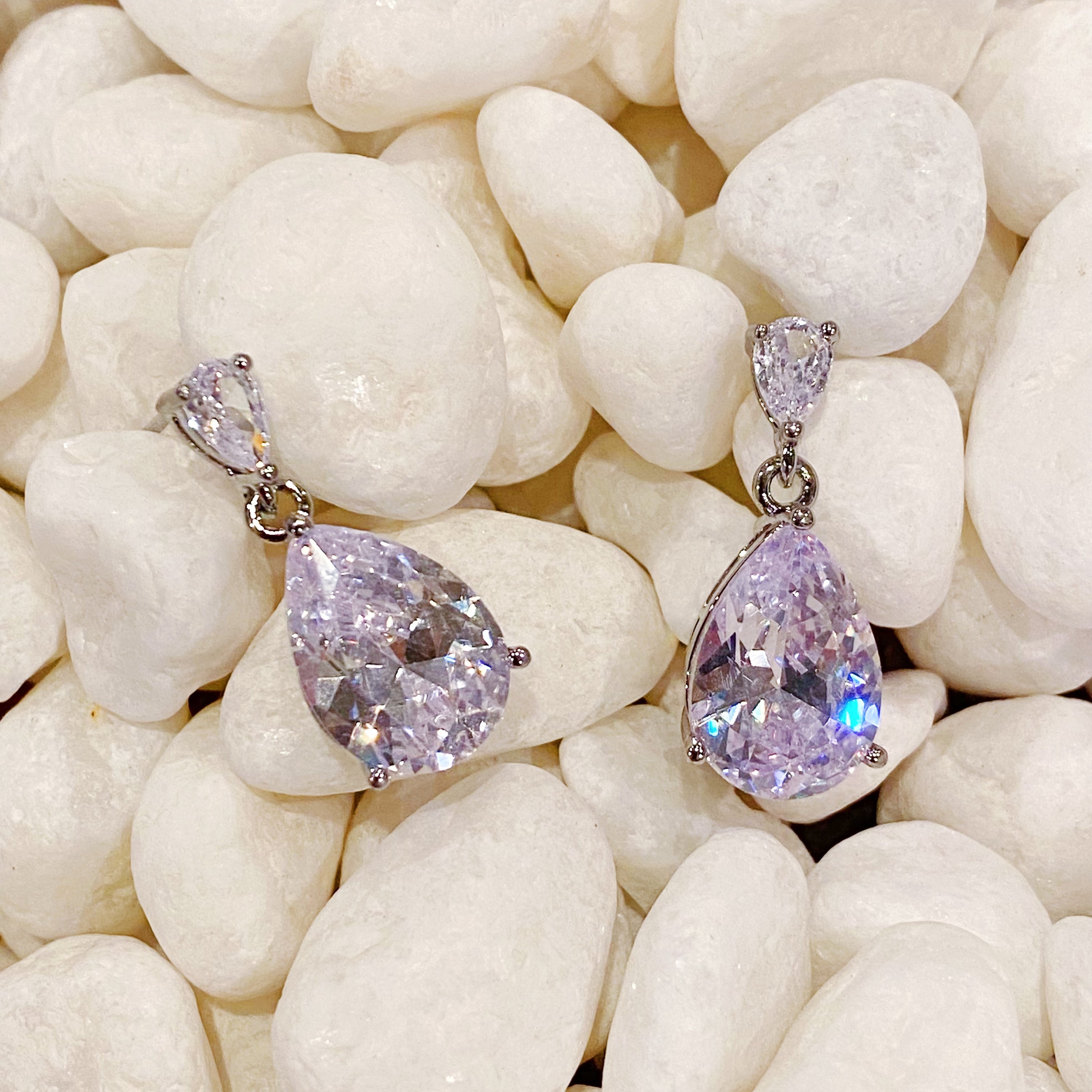 Elegant Crystal Clear Teardrop Earrings featuring sparkling cubic zirconia stones in a chic design.