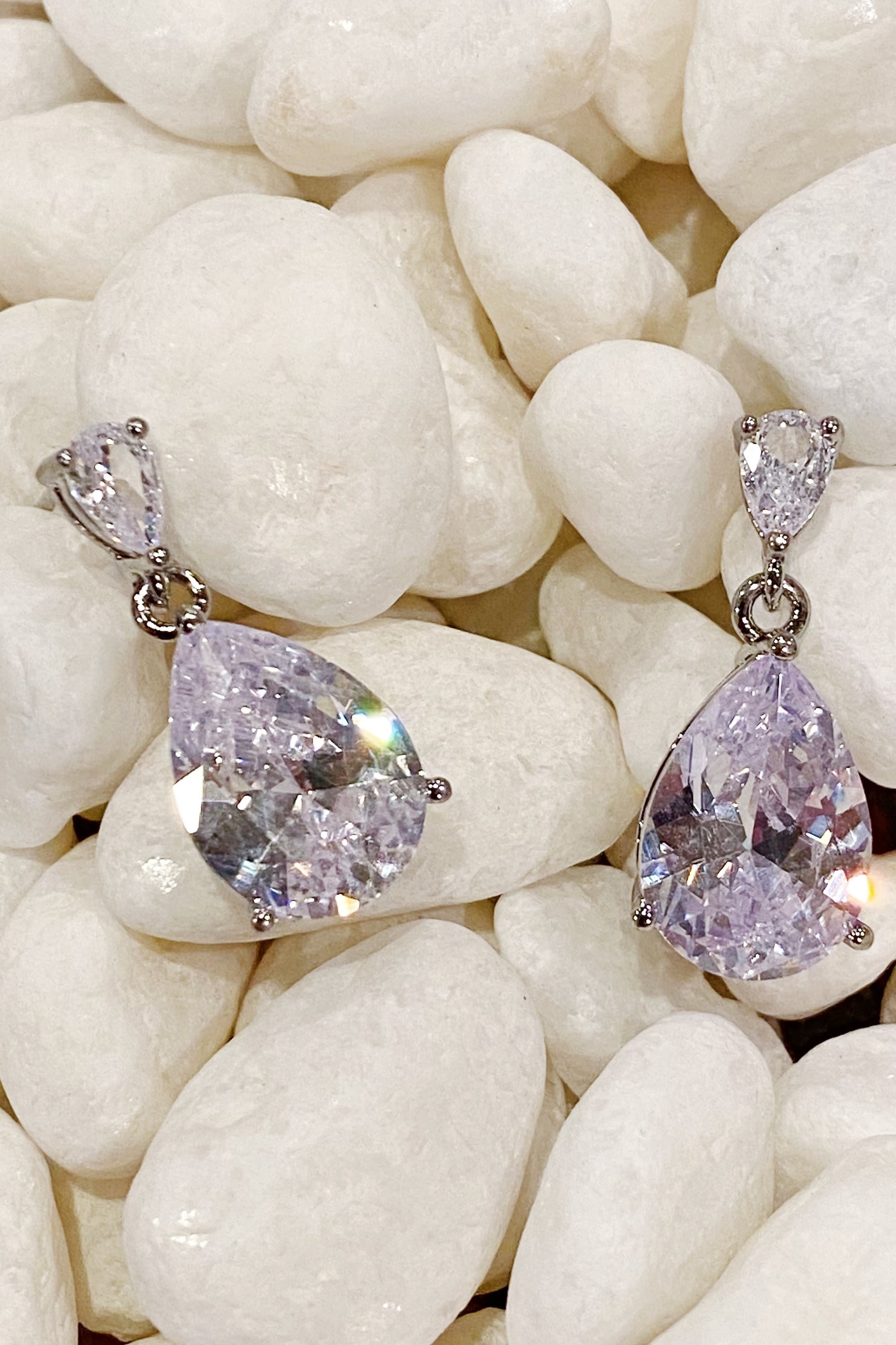 Elegant Crystal Clear Teardrop Earrings featuring sparkling cubic zirconia stones in a chic design.