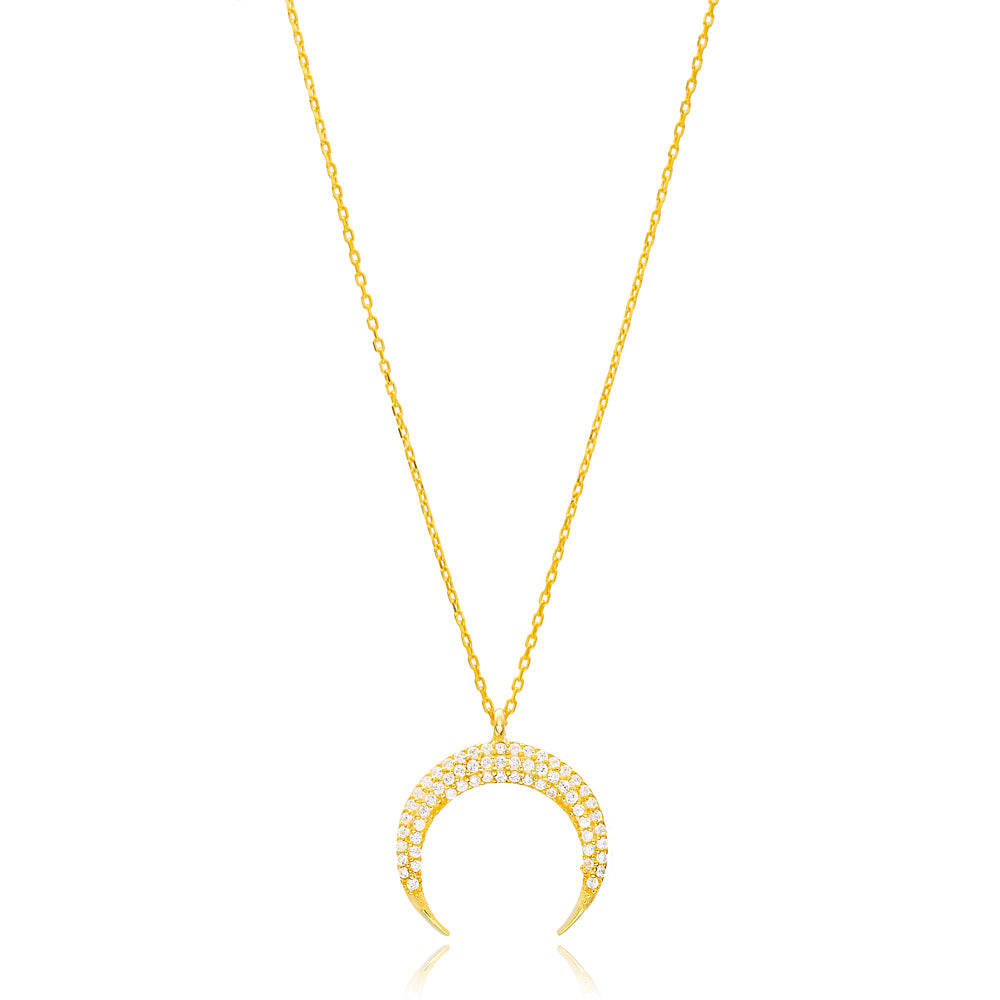 Elegant CRYSTAL Moon Necklace featuring a crescent moon design with sparkling cubic zirconia stones, crafted in 925 sterling silver with yellow gold plating.