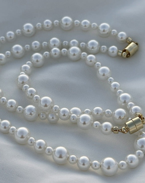 Elegant Crystal Pearl Hand-Knotted Necklace featuring oversized artificial pearls with French hand-knotting technique.