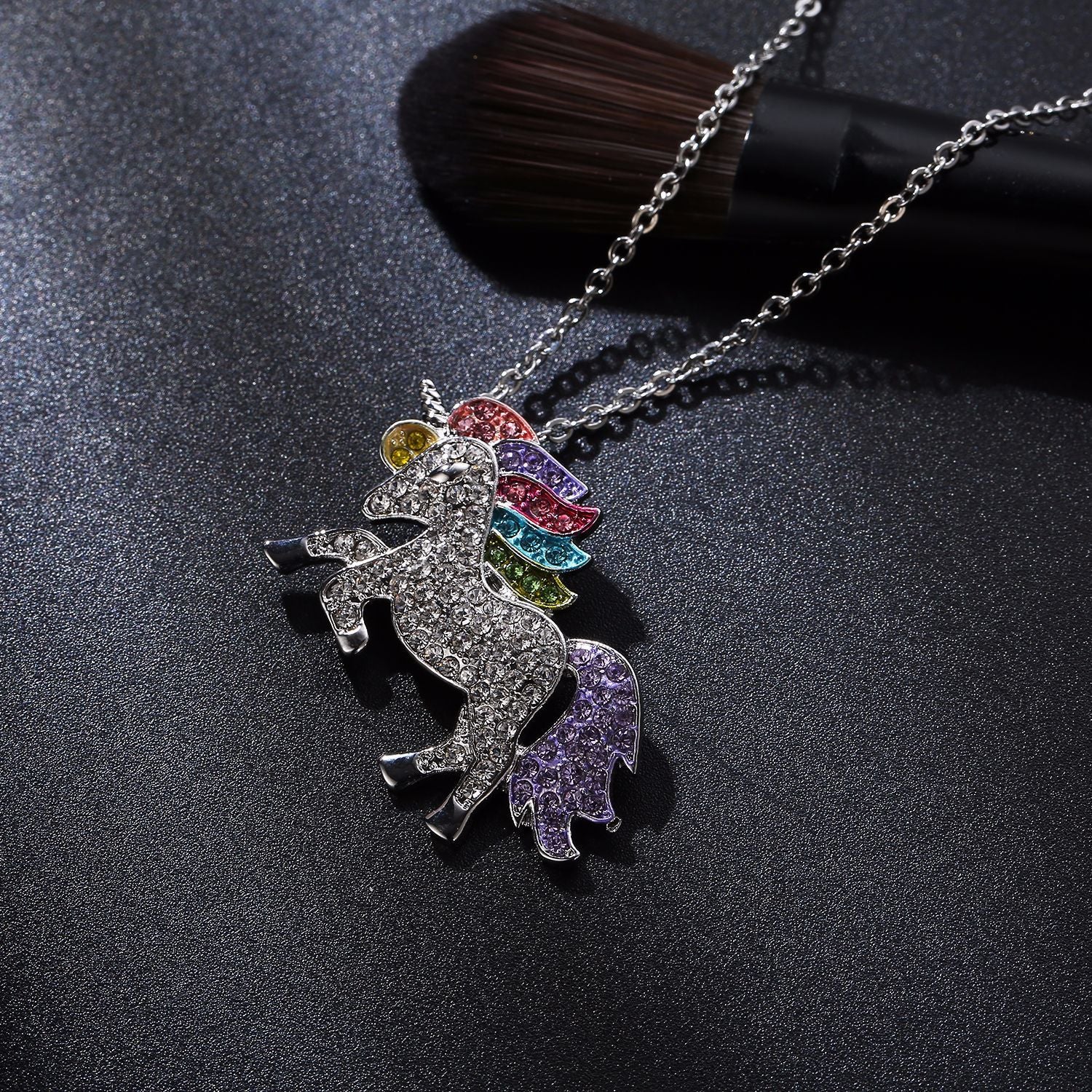 Crystal Rainbow Unicorn Necklace in 14K Gold with a majestic unicorn pendant and colorful Italian crystals.