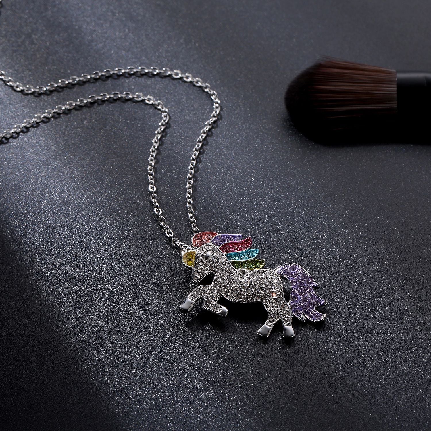 Crystal Rainbow Unicorn Necklace in 14K Gold with a majestic unicorn pendant and colorful Italian crystals.