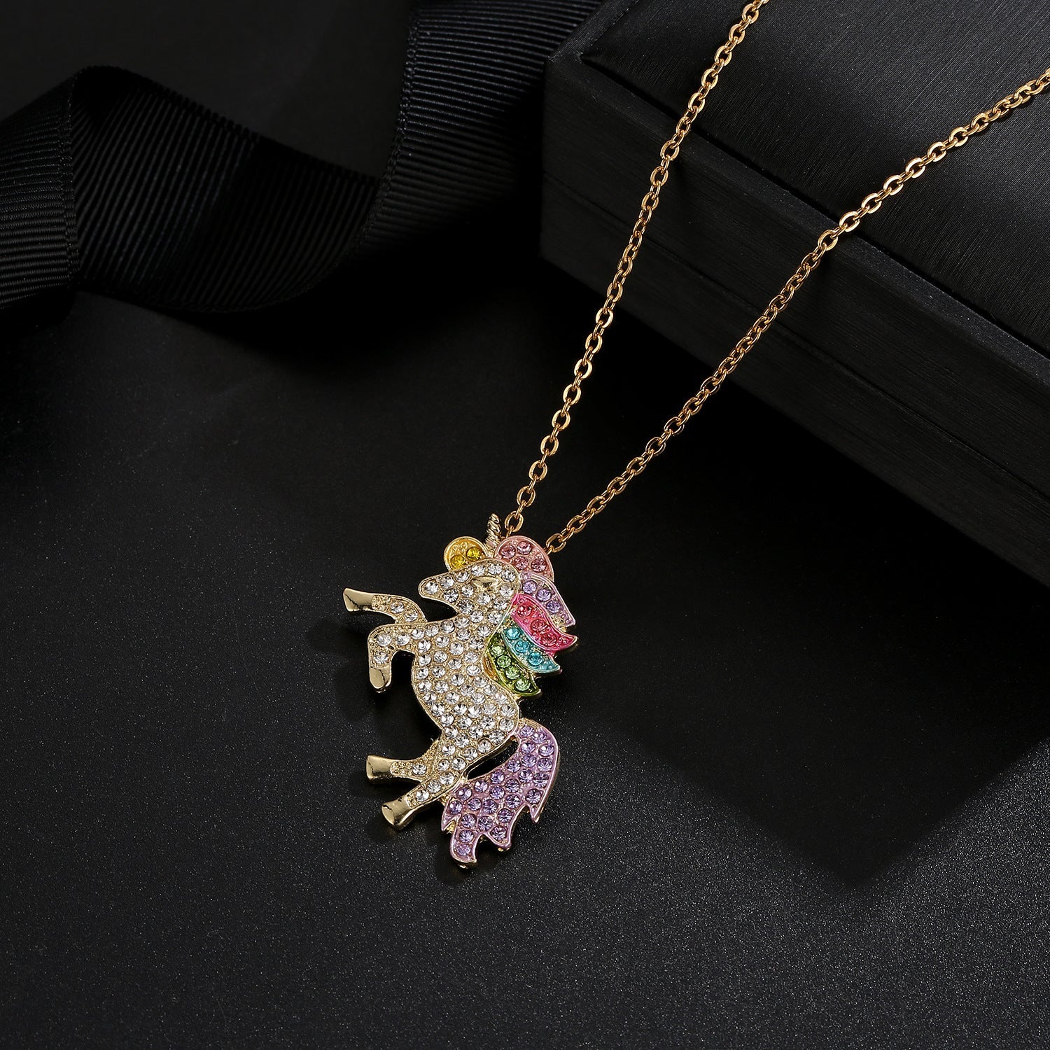 Crystal Rainbow Unicorn Necklace in 14K Gold with a majestic unicorn pendant and colorful Italian crystals.