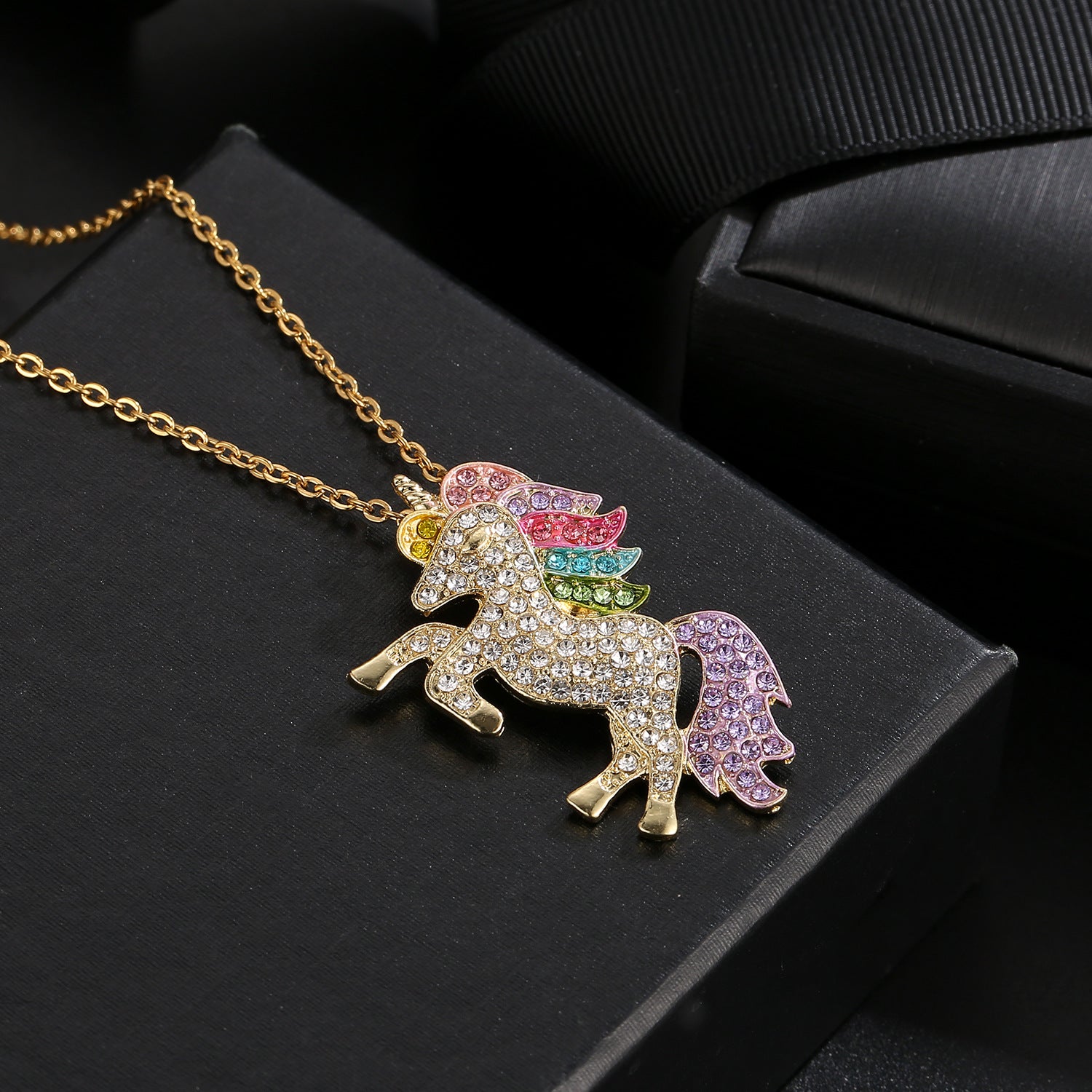 Crystal Rainbow Unicorn Necklace in 14K Gold with a majestic unicorn pendant and colorful Italian crystals.