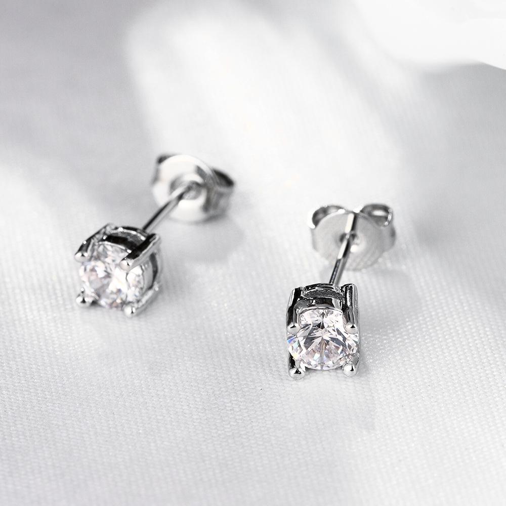 Elegant 6mm crystal stud earrings in 14K white gold plating, showcasing a brilliant shine and hypoallergenic design.