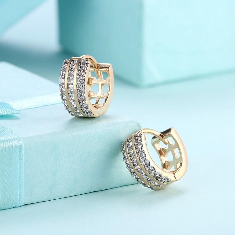 Elegant Crystal Three Dangling Lined Huggies in 18K Gold, showcasing sparkling crystals and a butterfly backing.