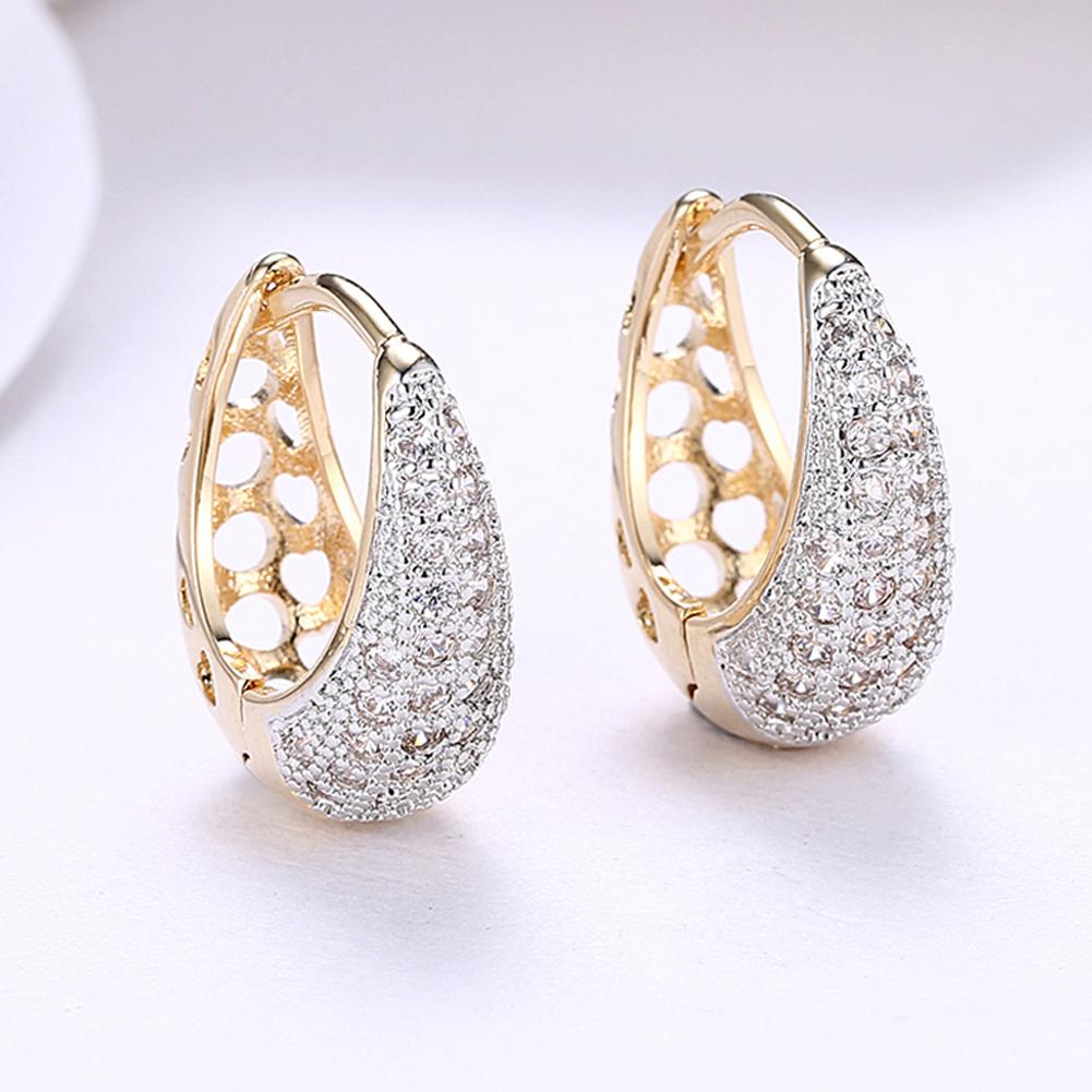 Elegant Crystals 18mm Pave Heart Filigree Teardrop Huggie Earrings in gold plating, featuring sparkling crystals and a comfortable fit.