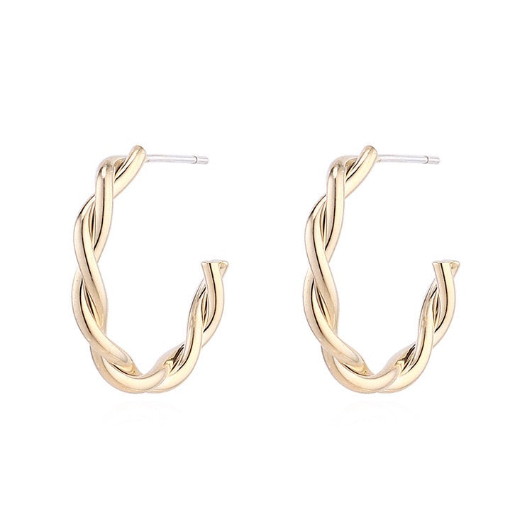 Elegant C-shaped rope earrings made from brass and s925 silver, showcasing a modern design.