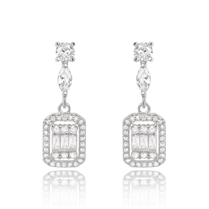 Elegant Cubic Zirconia Drop Earrings in white gold with white diamond crystals, showcasing their dainty design and butterfly back.