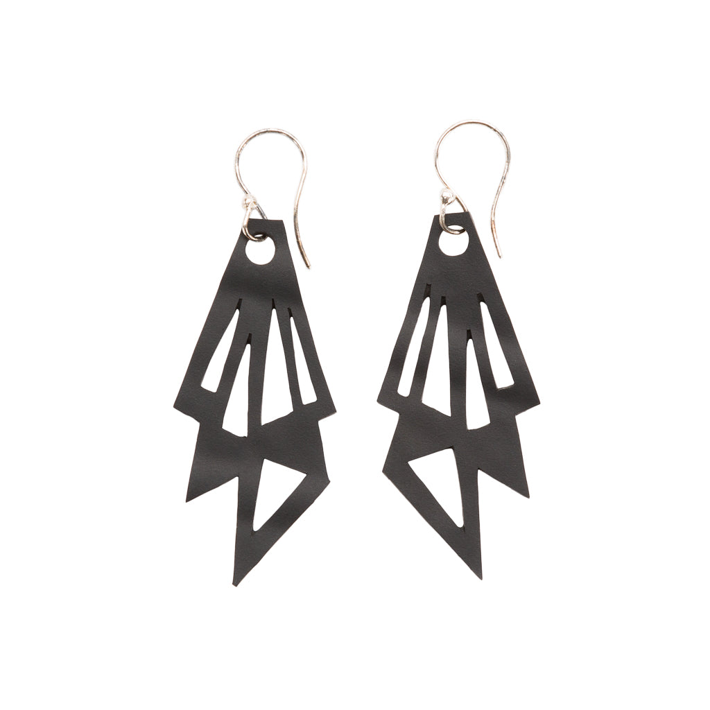 Handmade Cubism Recycled Rubber Geometric Earrings featuring unique black patterns and sterling silver hooks.