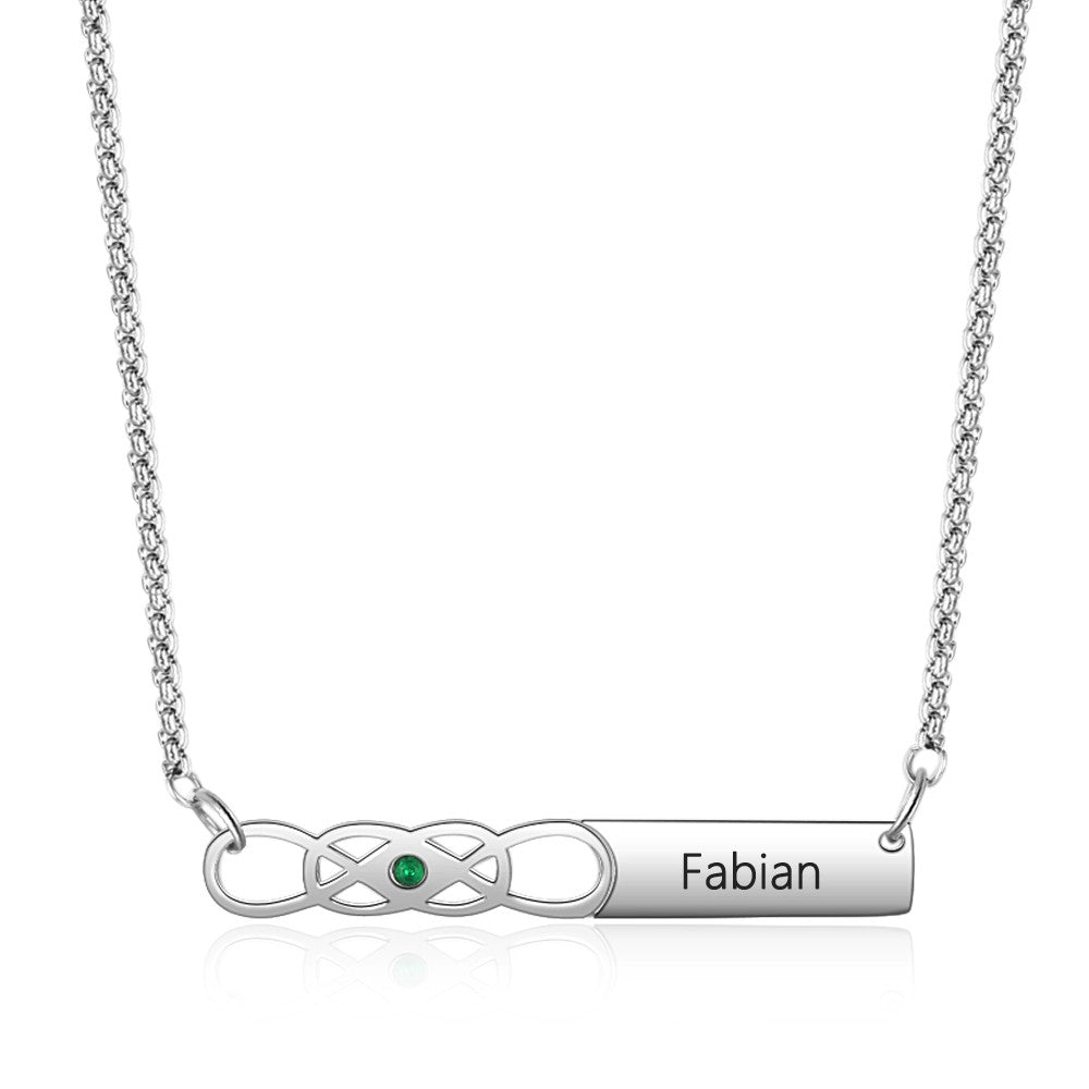 Custom Name Bar Birthstone Necklace made of stainless steel, featuring a personalized name bar and a birthstone, elegantly displayed on a soft background.