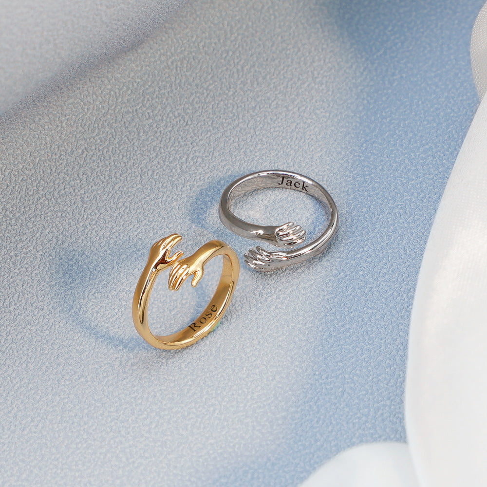 Custom Name Couple Open Engraving Ring made of stainless steel, featuring an adjustable design for comfort and personalized engraving options.