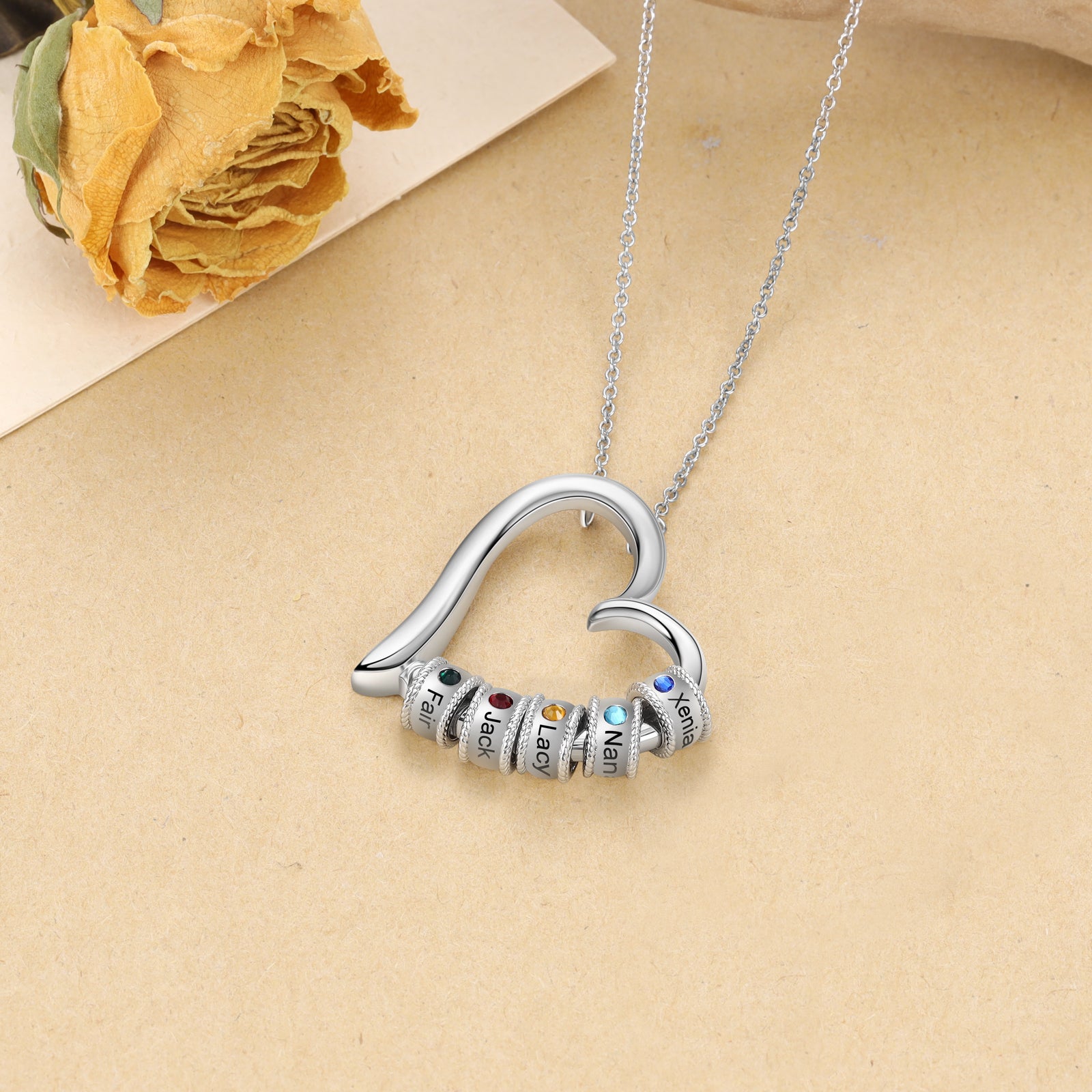 Custom Name Heart Pendant Necklace made of tarnish-resistant copper, featuring a heart-shaped pendant with a personalized name engraving and a sparkling cubic zirconia stone.