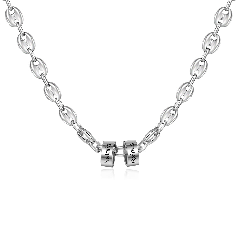 A beautiful custom stainless steel bead necklace featuring personalized name engravings, showcasing its elegant design and adjustable length.