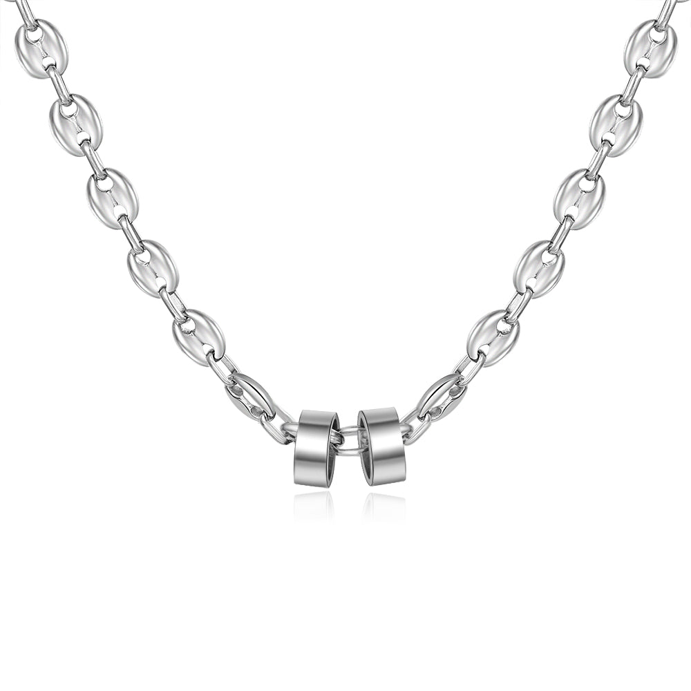 A beautiful custom stainless steel bead necklace featuring personalized name engravings, showcasing its elegant design and adjustable length.